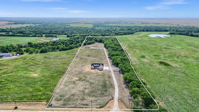 bird's eye view featuring a water view and a rural view