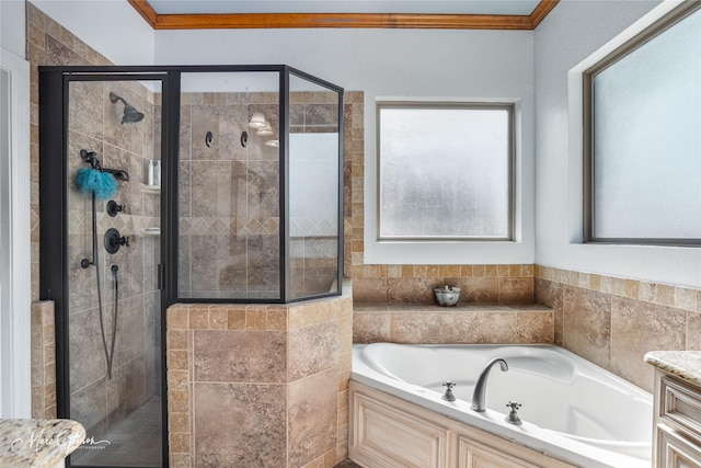 bathroom with vanity, independent shower and bath, and crown molding