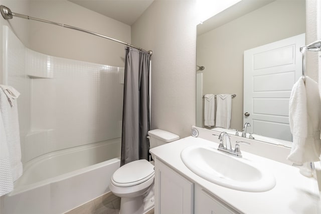 full bathroom featuring vanity, toilet, and shower / bath combination with curtain