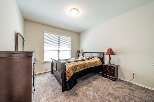 bedroom with light colored carpet