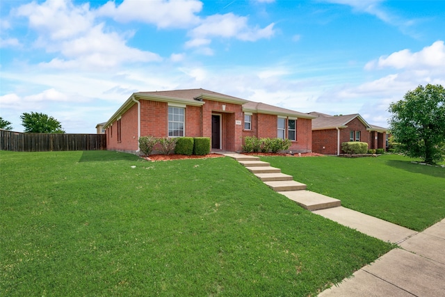 single story home with a front yard