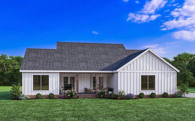 modern farmhouse featuring a front lawn