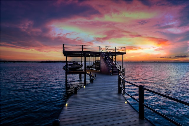 dock area with a water view