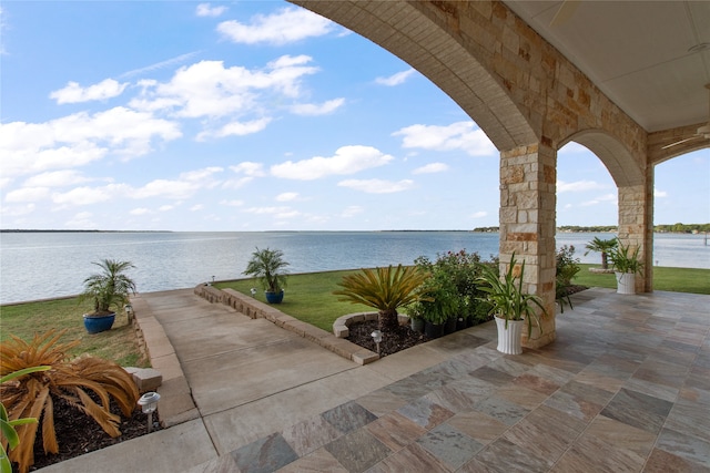 view of patio / terrace featuring a water view