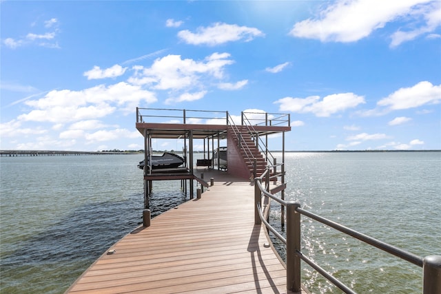 dock area featuring a water view