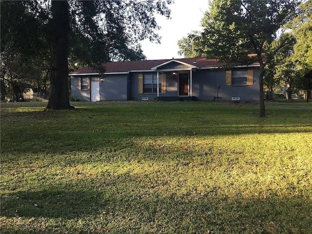 ranch-style house with a front yard