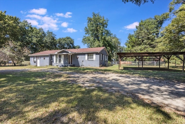 ranch-style home with a front yard