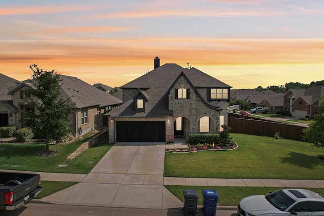 view of front of property with a lawn