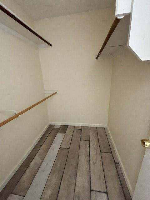 2413 Markland St, Irving, TX 75060 - spacious closet with wood finished floors