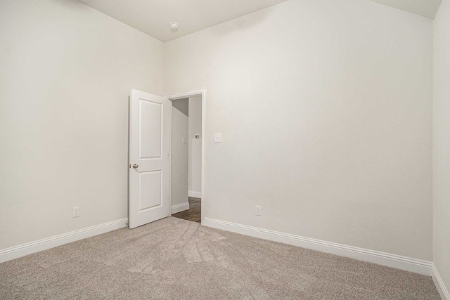 spare room featuring carpet floors