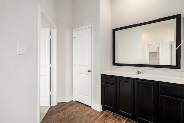 bathroom featuring hardwood / wood-style floors and vanity