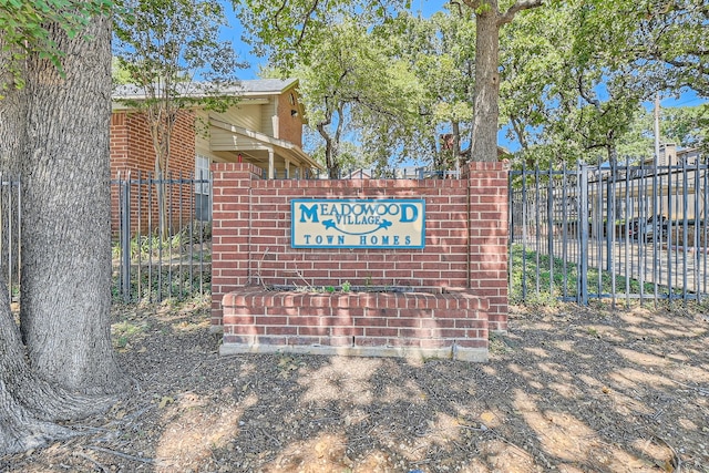 view of community sign