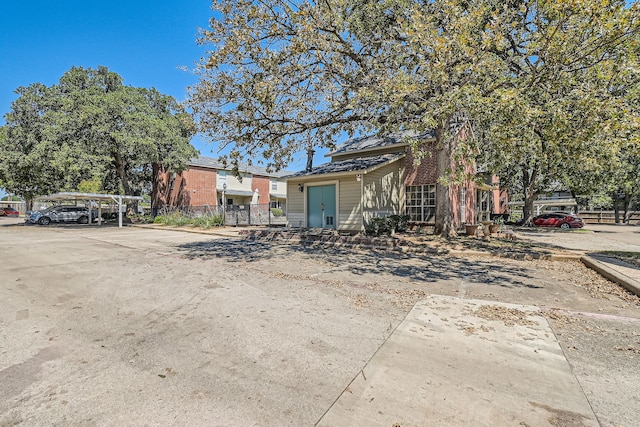 view of front facade featuring a carport