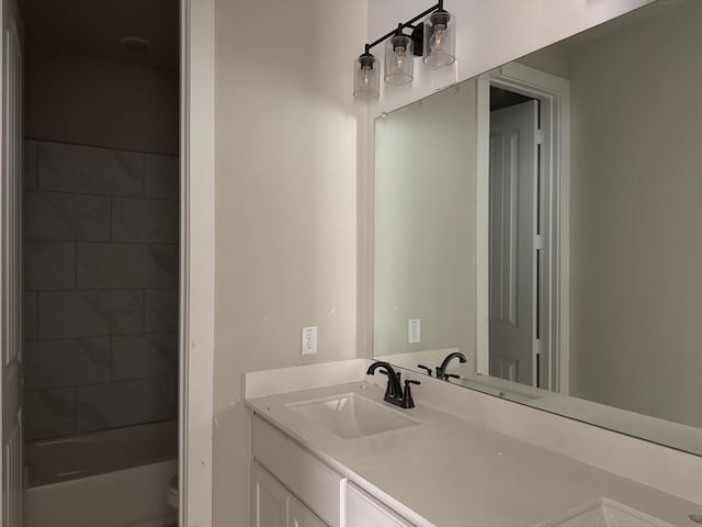 full bathroom featuring vanity, toilet, and shower / washtub combination