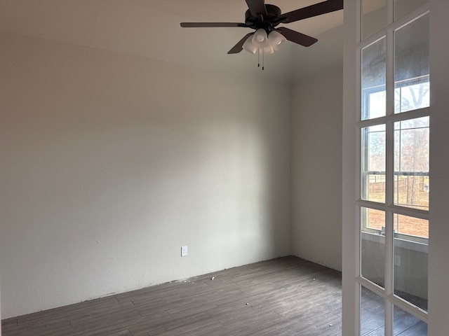 empty room featuring hardwood / wood-style floors and ceiling fan