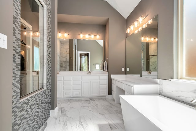 bathroom with vanity, lofted ceiling, and plus walk in shower