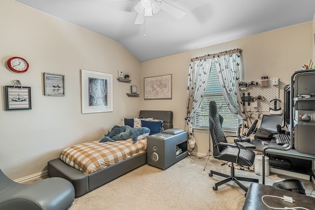 interior space with ceiling fan and vaulted ceiling