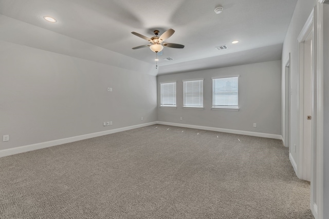 unfurnished bedroom featuring light colored carpet and ceiling fan