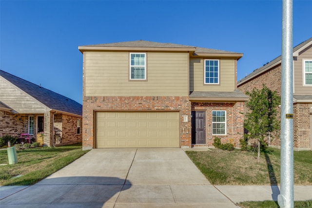 view of front property with a garage and a front yard