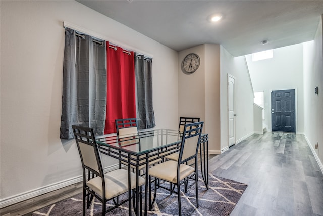 dining area with wood-type flooring