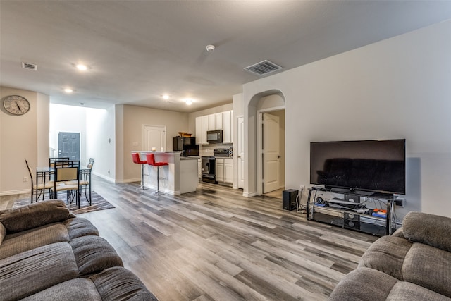 living room with light wood-type flooring