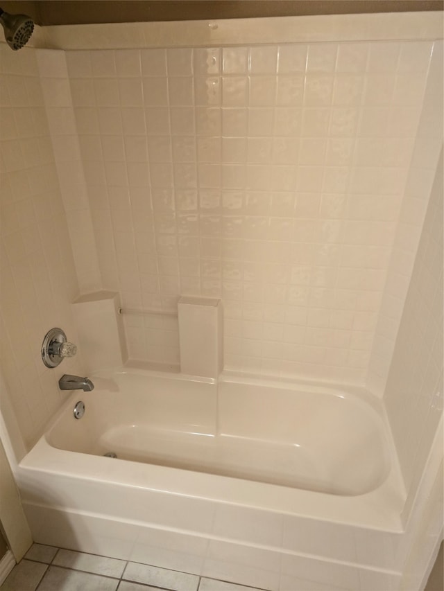 bathroom featuring shower / bathtub combination and tile patterned floors