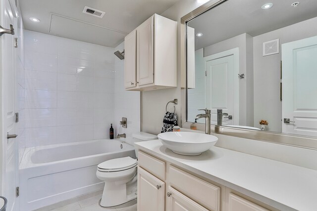 full bathroom with vanity, toilet, shower / bathtub combination, and tile patterned flooring