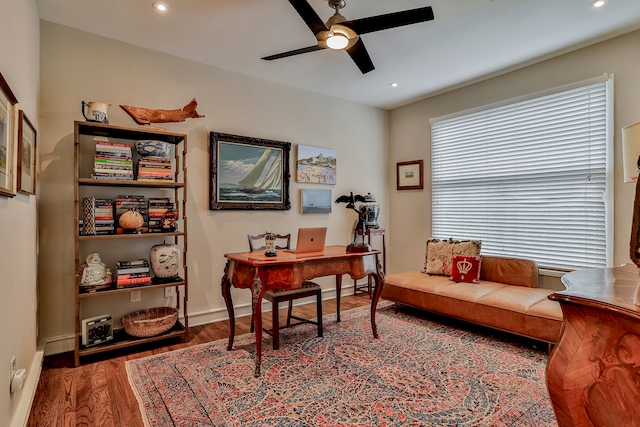 office featuring hardwood / wood-style floors and ceiling fan