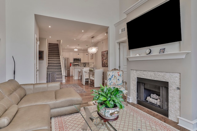 living room with light hardwood / wood-style flooring