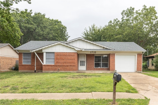 ranch-style home with a garage and a front lawn