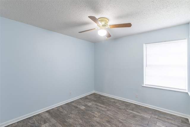 spare room featuring a textured ceiling, ceiling fan, and dark hardwood / wood-style floors