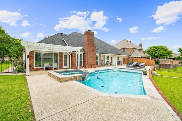 view of swimming pool featuring a yard, a pergola, a patio, and an in ground hot tub