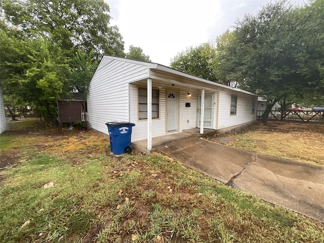 view of front of house with a patio area