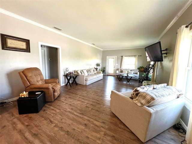 living room featuring ornamental molding and dark hardwood / wood-style flooring