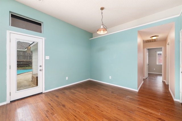 empty room featuring hardwood / wood-style floors