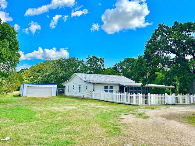 view of front facade with a garage and a front yard