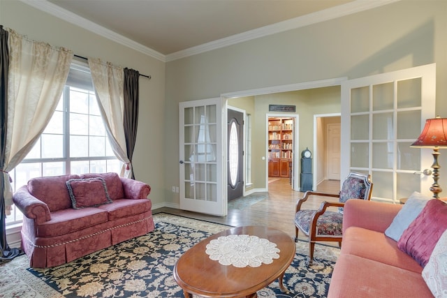 living room featuring light wood-type flooring, french doors, and ornamental molding