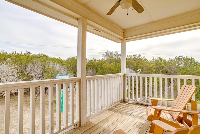 wooden deck with ceiling fan