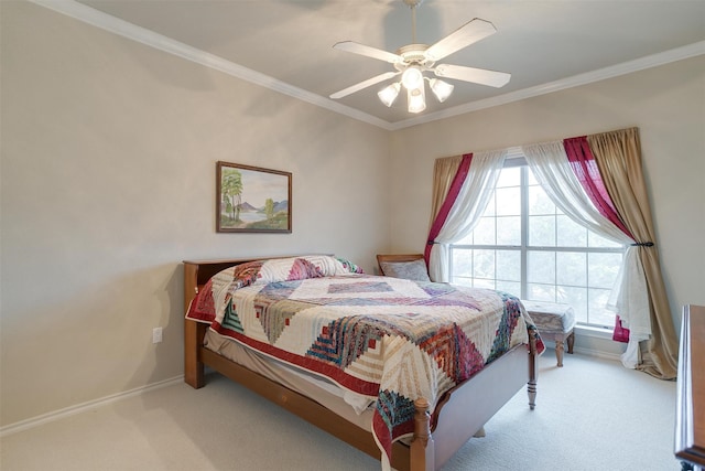 bedroom with multiple windows, light carpet, and ceiling fan