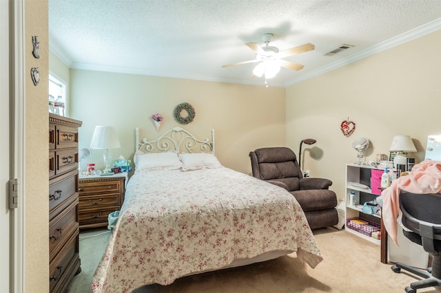 carpeted bedroom with ornamental molding, a textured ceiling, and ceiling fan