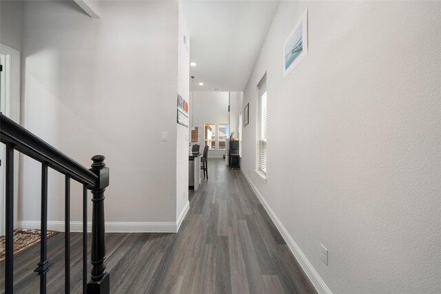 hall featuring dark wood-type flooring