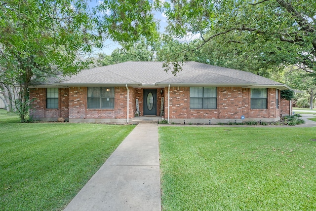 single story home with a front yard