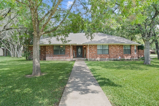 single story home featuring a front yard