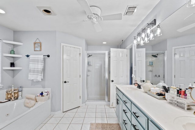 bathroom featuring vanity, ceiling fan, tile patterned floors, and plus walk in shower