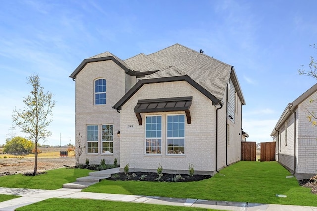 view of front facade with a front lawn