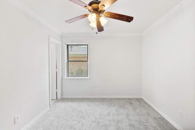 unfurnished room with crown molding, ceiling fan, and light carpet