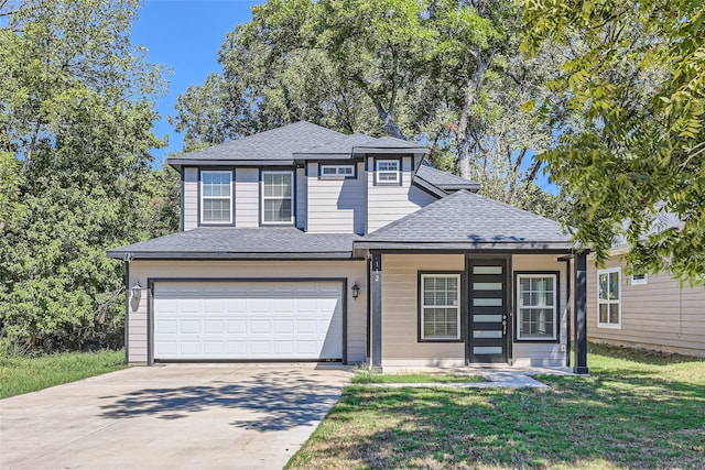 view of front facade featuring covered porch, a garage, and a front yard