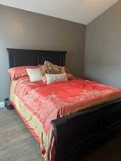 bedroom with wood-type flooring