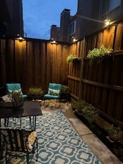 view of patio at night