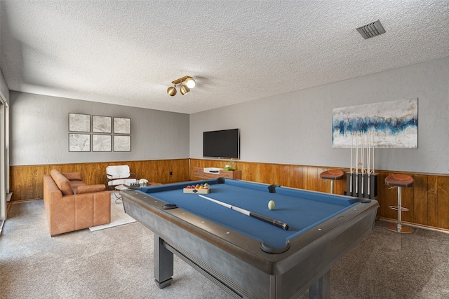 recreation room featuring carpet flooring, a textured ceiling, and billiards